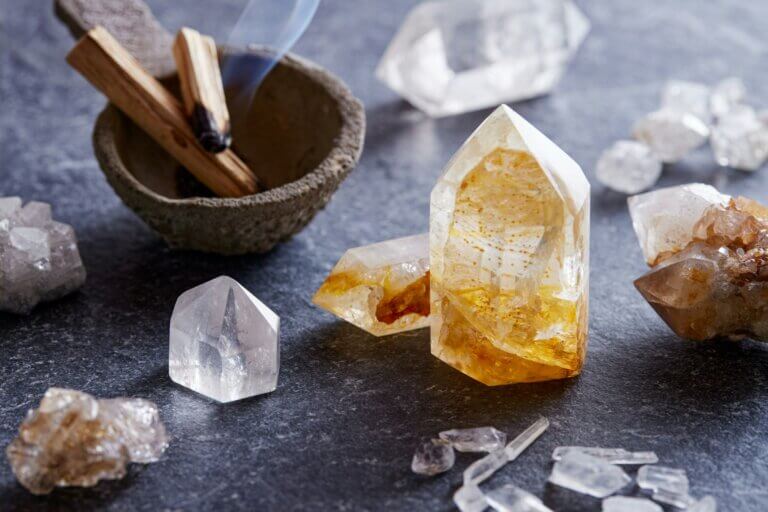 gemstone crystals with palo santo wood for holistic therapy.jpg